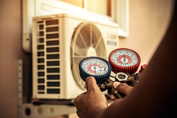 Professional Heat Pump Repair technician working in Central City, KY
